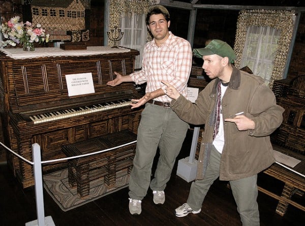Piano is covered with rolls of paper