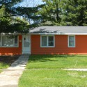 Fermilab’s Village Houses and the Large Hadron Collider